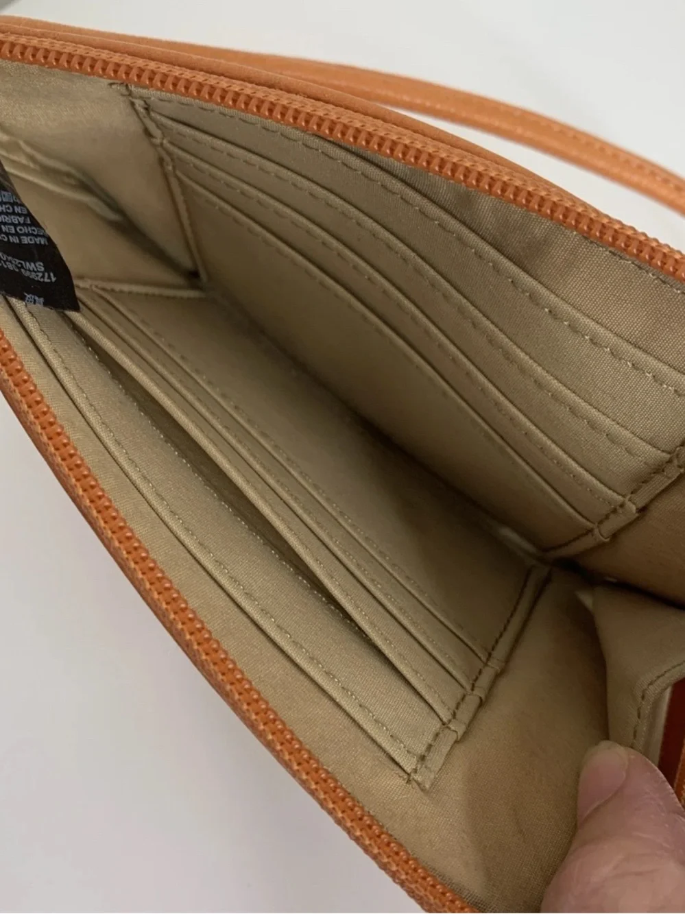Fossil leather wristlet